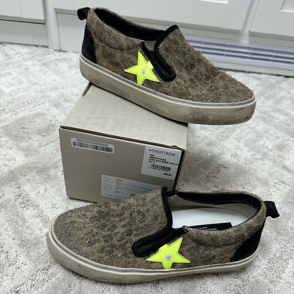 Golden goose slip on shoes.